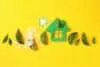 Green energy recycled concept on yellow background